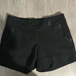 Pre loved classic black Bebe shorts. I use to work there i believe these are a 6